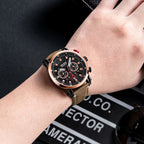 MEGIR 2085 men's chronograph watch on the wrist, rose-gold bezel with black dial and brown leather strap