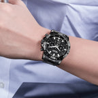 MEGIR 2087 men's chronograph watch on the wrist, black case with black dial and black stainless steel bracelet
