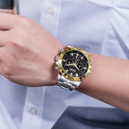 MEGIR 2087 men's chronograph watch on the wrist, gold-tone bezel with black dial and stainless steel bracelet
