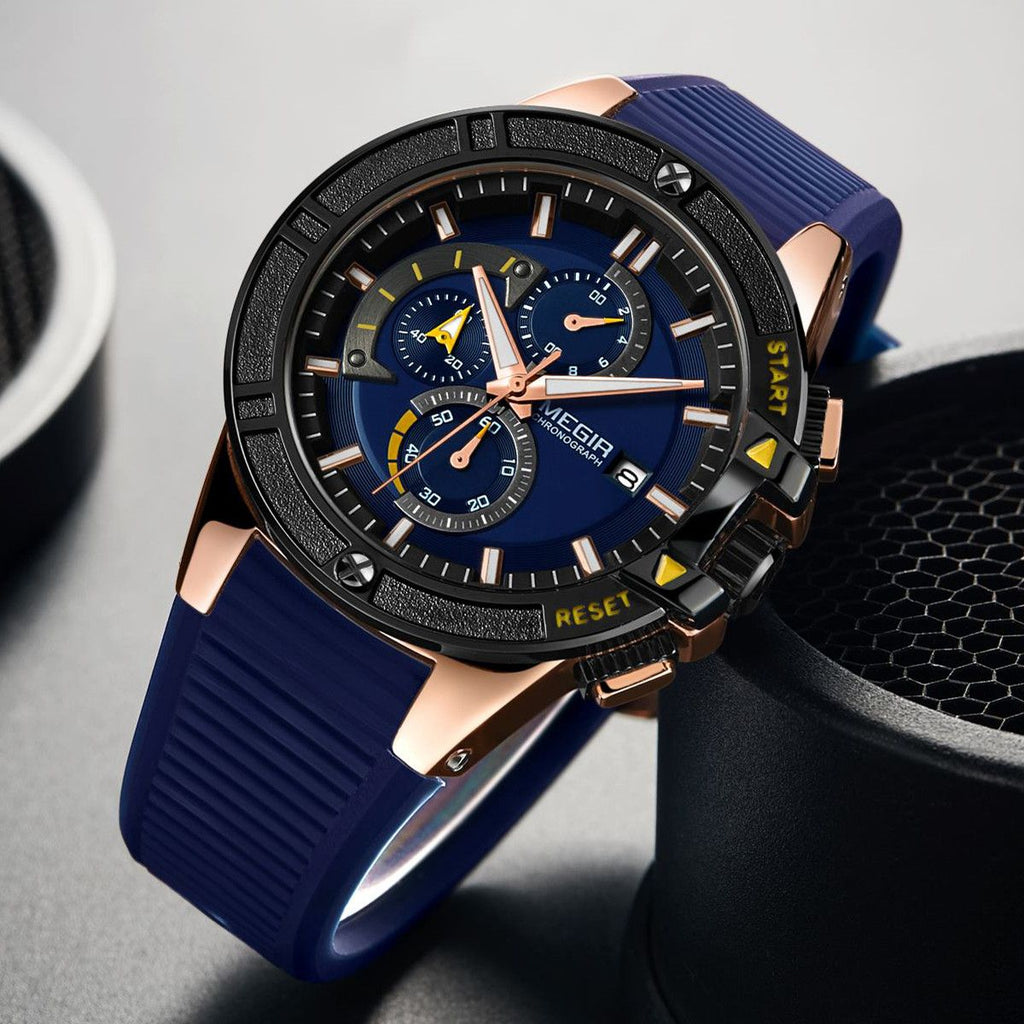 MEGIR 2095 men's chronograph watch, rose-gold case with blue dial, yellow accents and blue silicone strap, angled view