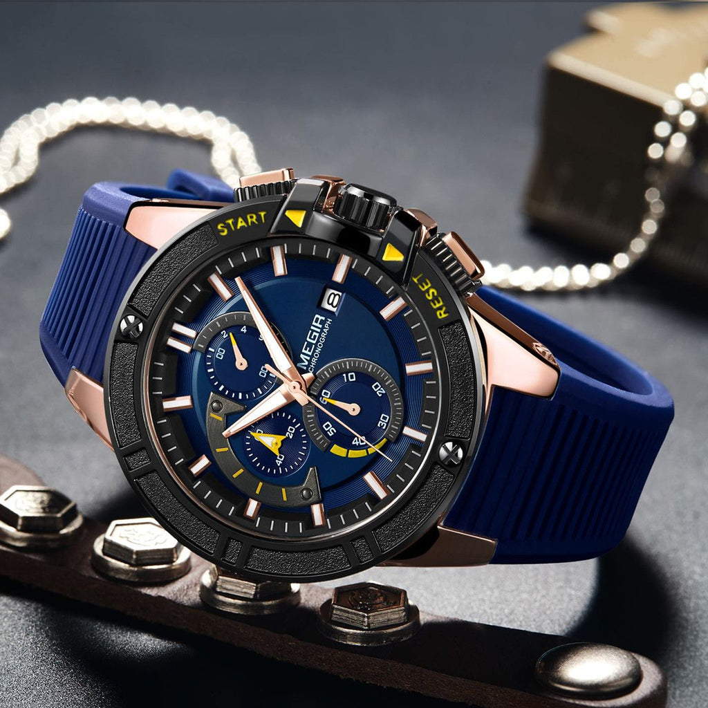 MEGIR 2095 men's chronograph watch, rose-gold case with blue dial, yellow accents and blue silicone strap, three-quarter view