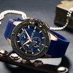 MEGIR 2095 men's chronograph watch, rose-gold case with blue dial, yellow accents and blue silicone strap, three-quarter view
