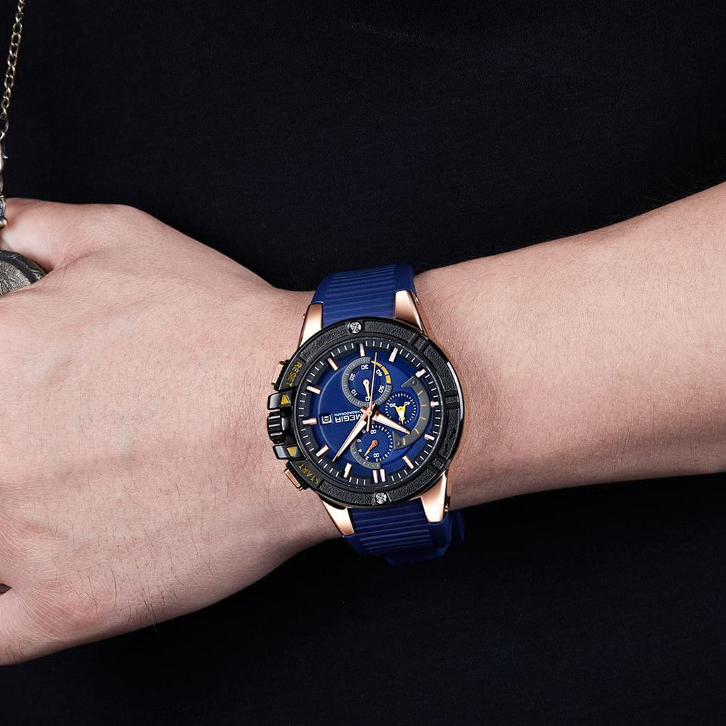MEGIR 2095 men's chronograph watch on the wrist, rose-gold case with blue dial and blue silicone strap