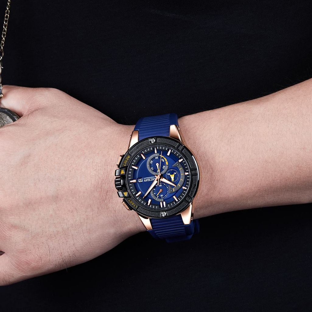 MEGIR 2095 men's chronograph watch on the wrist, rose-gold case with blue dial and blue silicone strap