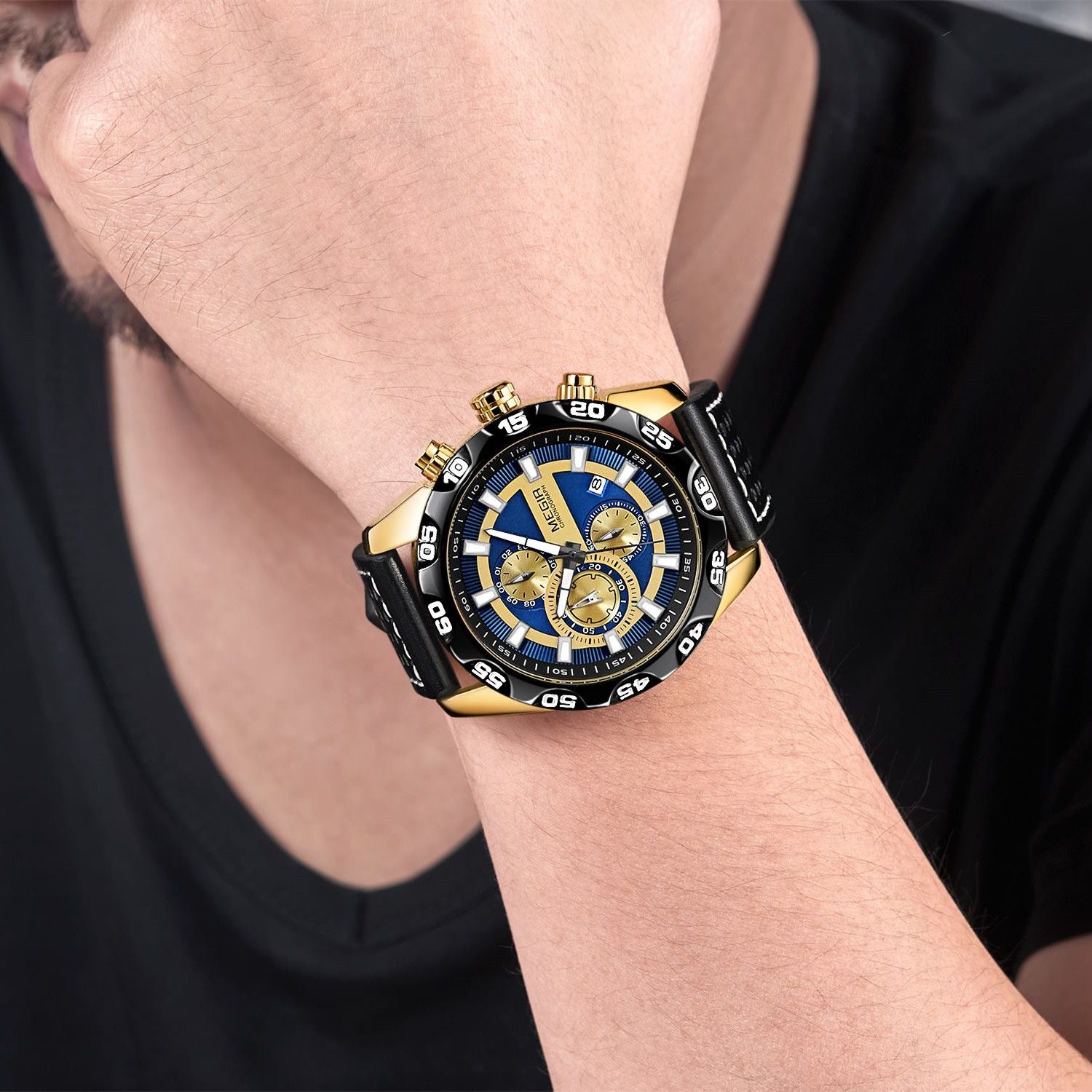 MEGIR 2096 men's chronograph watch on the wrist, gold-tone accents with blue and gold dial and black leather strap, close-up