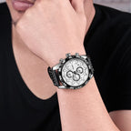 MEGIR 2096 men's chronograph watch on the wrist, silver case with white dial and black leather strap