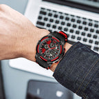 MEGIR 2097 men's chronograph watch on the wrist, black case with black dial, red accents and black silicone strap