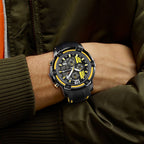 MEGIR 2097 men's chronograph watch on the wrist, black case with black dial, yellow accents and black silicone strap
