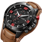 MEGIR 2099 men's chronograph watch, black bezel with black dial, red numerals and brown leather cuff strap, angled view