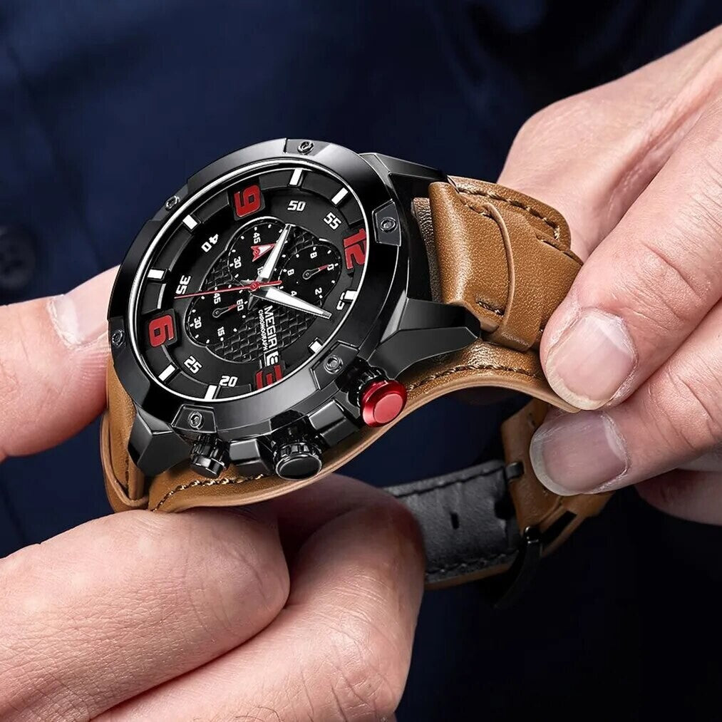 MEGIR 2099 men's chronograph watch held in hand, black bezel with black dial and brown leather cuff strap