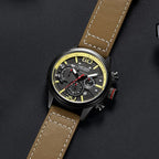MEGIR 2110 men's chronograph watch, black case with black dial, yellow accents and brown leather strap, three-quarter view