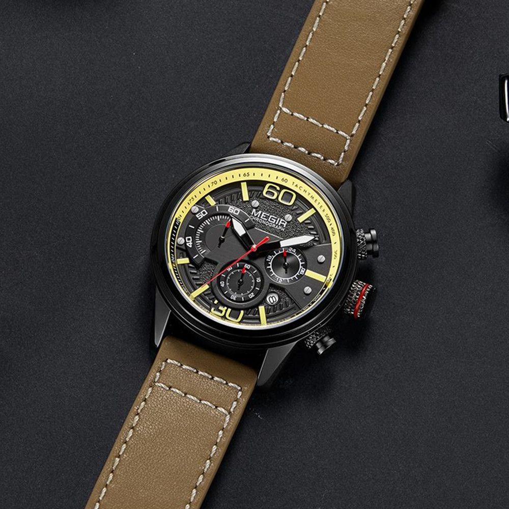 MEGIR 2110 men's chronograph watch, black case with black dial, yellow accents and brown leather strap, three-quarter view