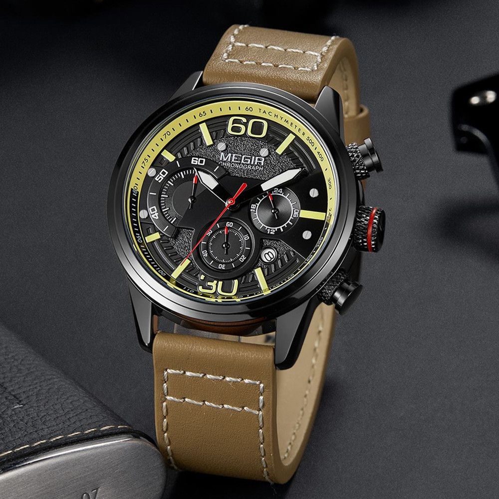 MEGIR 2110 men's chronograph watch, black case with black dial, yellow accents and brown leather strap, angled view