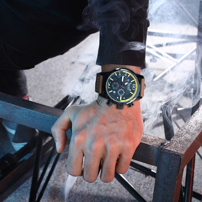 MEGIR 2110 men's chronograph watch on the wrist, black case with black dial and brown leather strap
