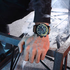 MEGIR 2110 men's chronograph watch on the wrist, black case with black dial and brown leather strap