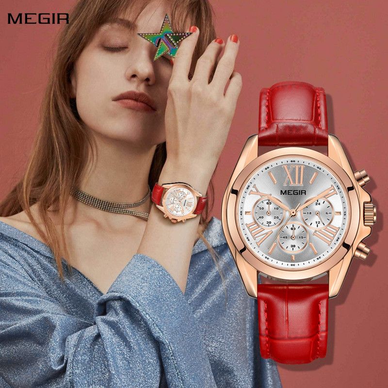 MEGIR 2114 women's chronograph watch worn on the wrist with a red leather strap and rose-gold case