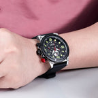 MEGIR 2116 men's chronograph watch on the wrist, silver case with black dial, green numerals and black silicone strap