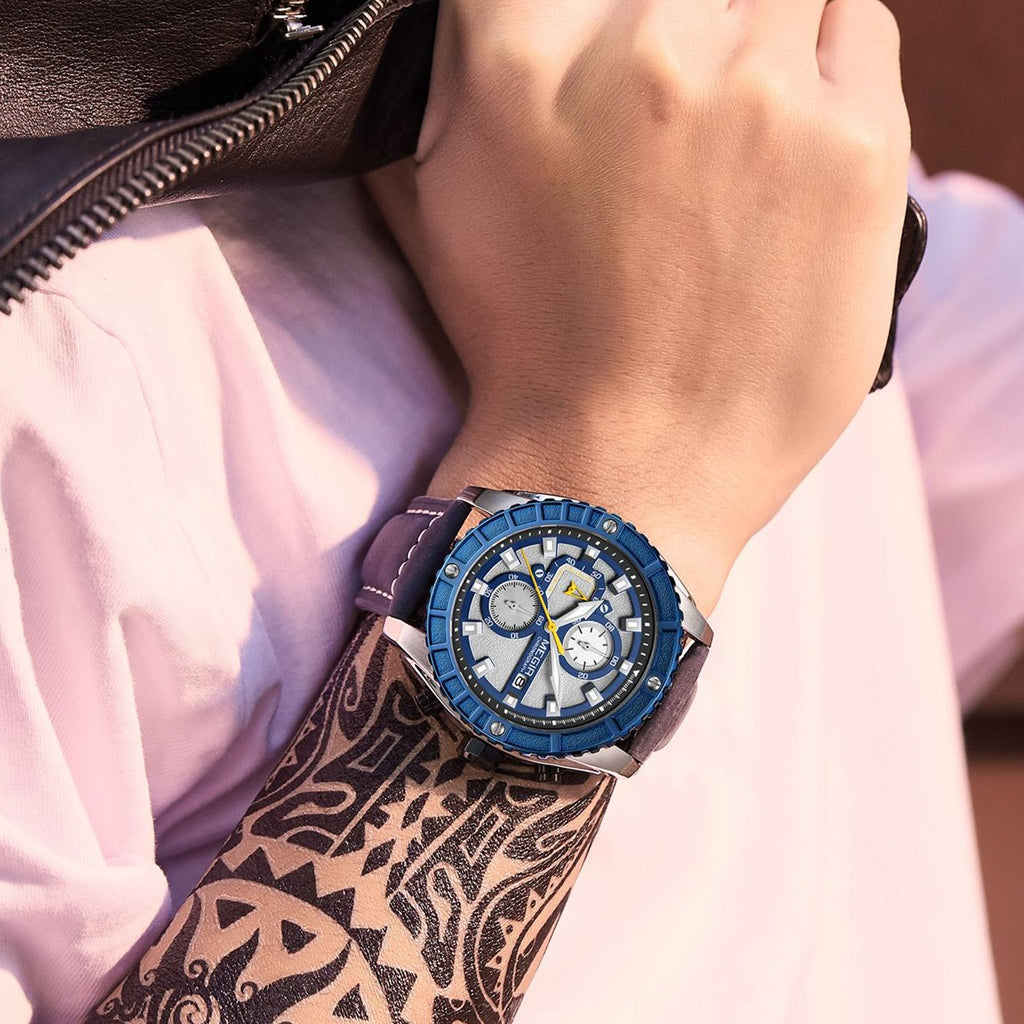 MEGIR 2119 men's chronograph watch on the wrist, silver case with blue bezel and white dial, close-up