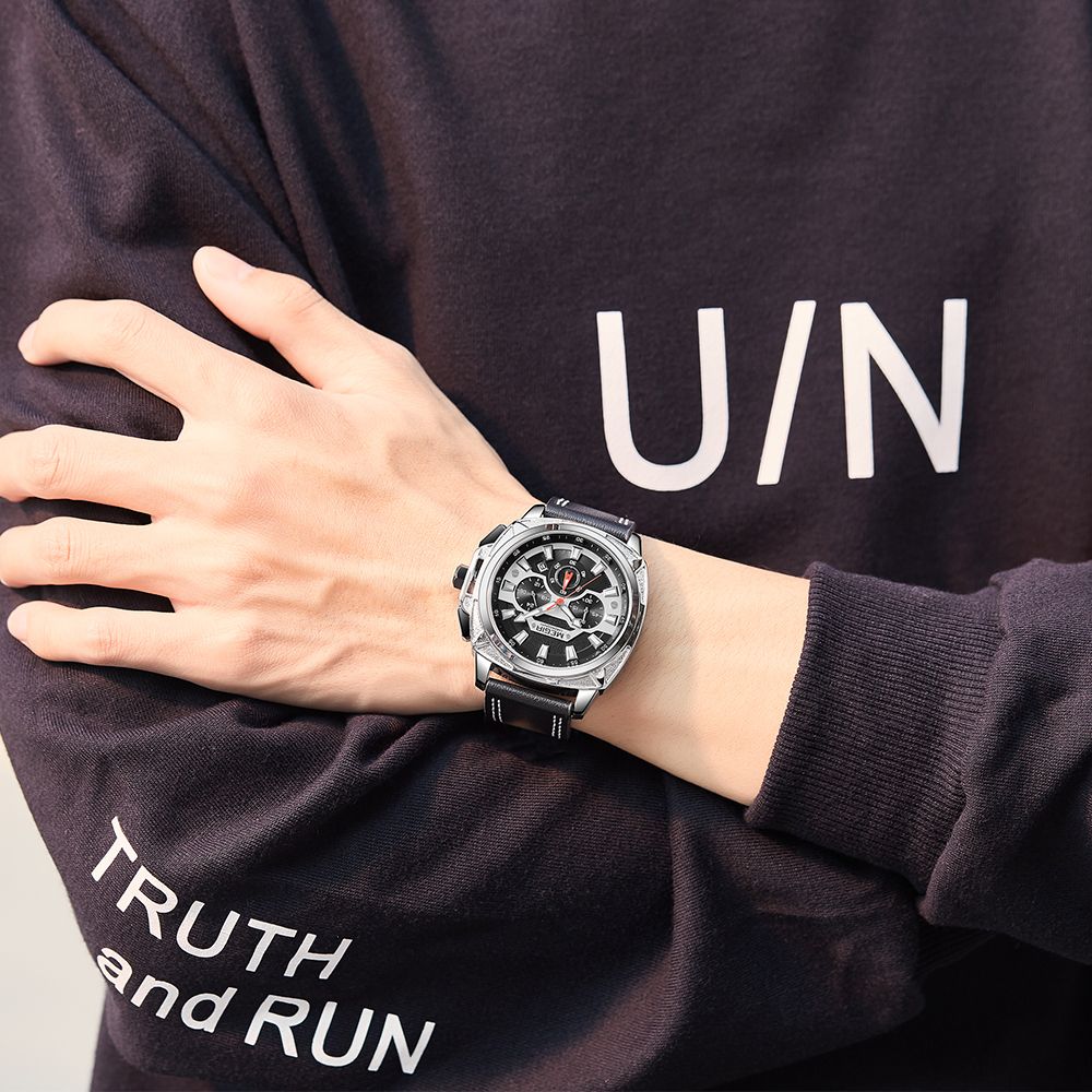 MEGIR 2128 men's chronograph watch on the wrist, silver case with black dial and black leather strap