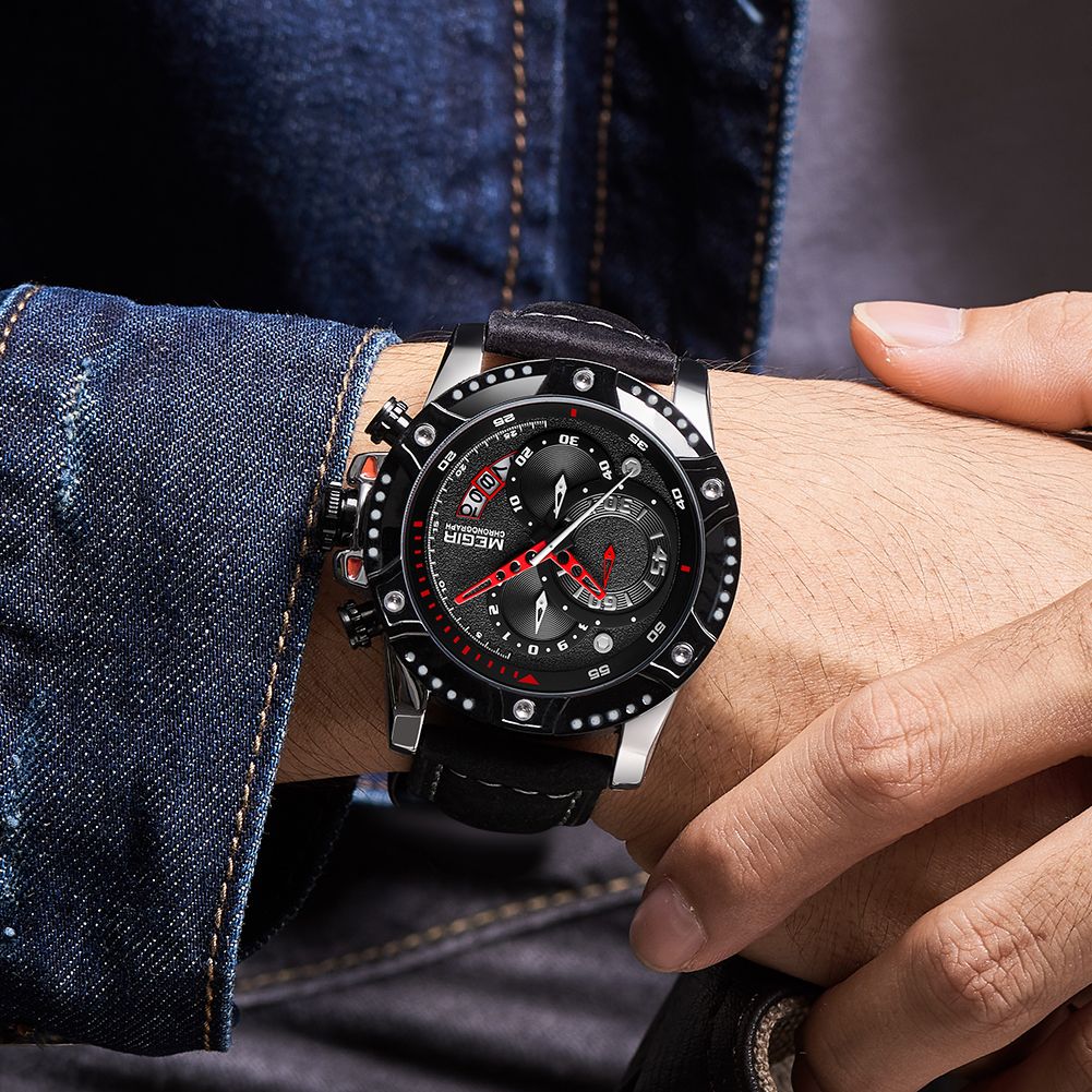 MEGIR 2130 men's chronograph watch on the wrist, black case with black dial and black leather strap