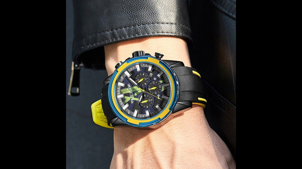 MEGIR 2133 men's chronograph watch on the wrist, black case with blue-and-yellow bezel and black silicone strap, close-up