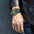 MEGIR 2133 men's chronograph watch on the wrist, black case with blue-and-yellow bezel and black silicone strap