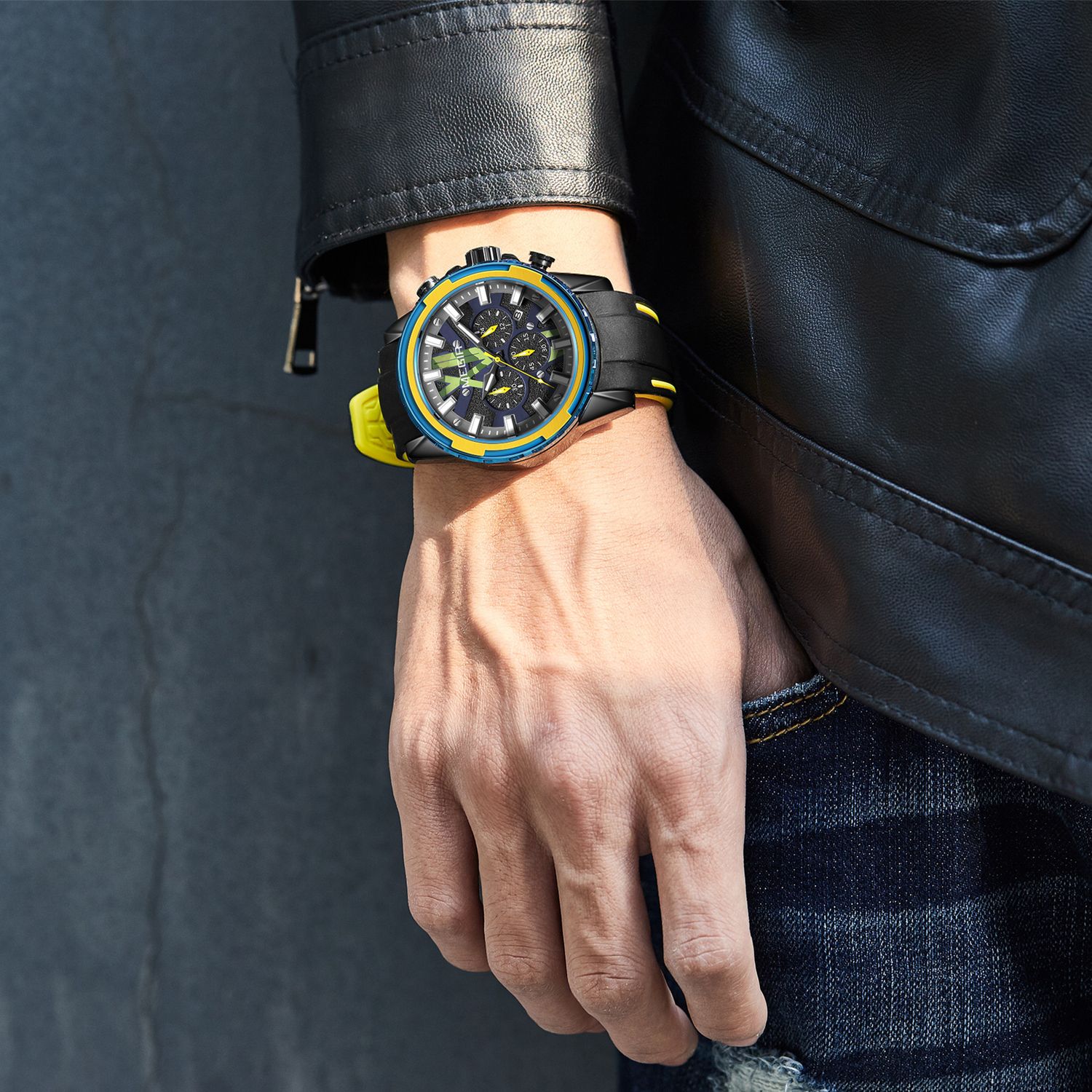 MEGIR 2133 men's chronograph watch on the wrist, black case with blue-and-yellow bezel and black silicone strap