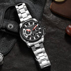 MEGIR 2134 men's chronograph watch, silver case with black dial and stainless steel bracelet, angled view