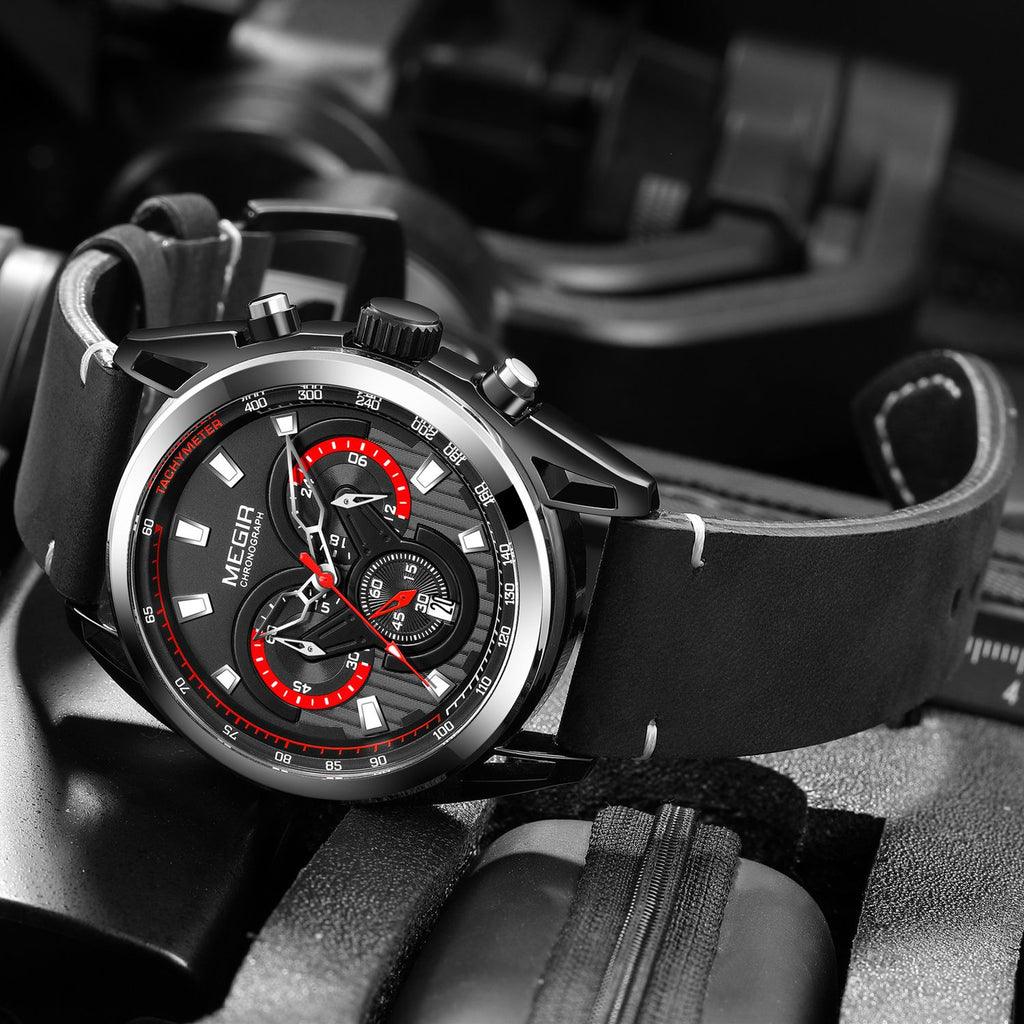 MEGIR 2135 men's chronograph watch, black case with black dial and black leather strap, angled view