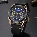 MEGIR 2135 men's chronograph watch, rose-gold case with blue dial and black leather strap, angled view