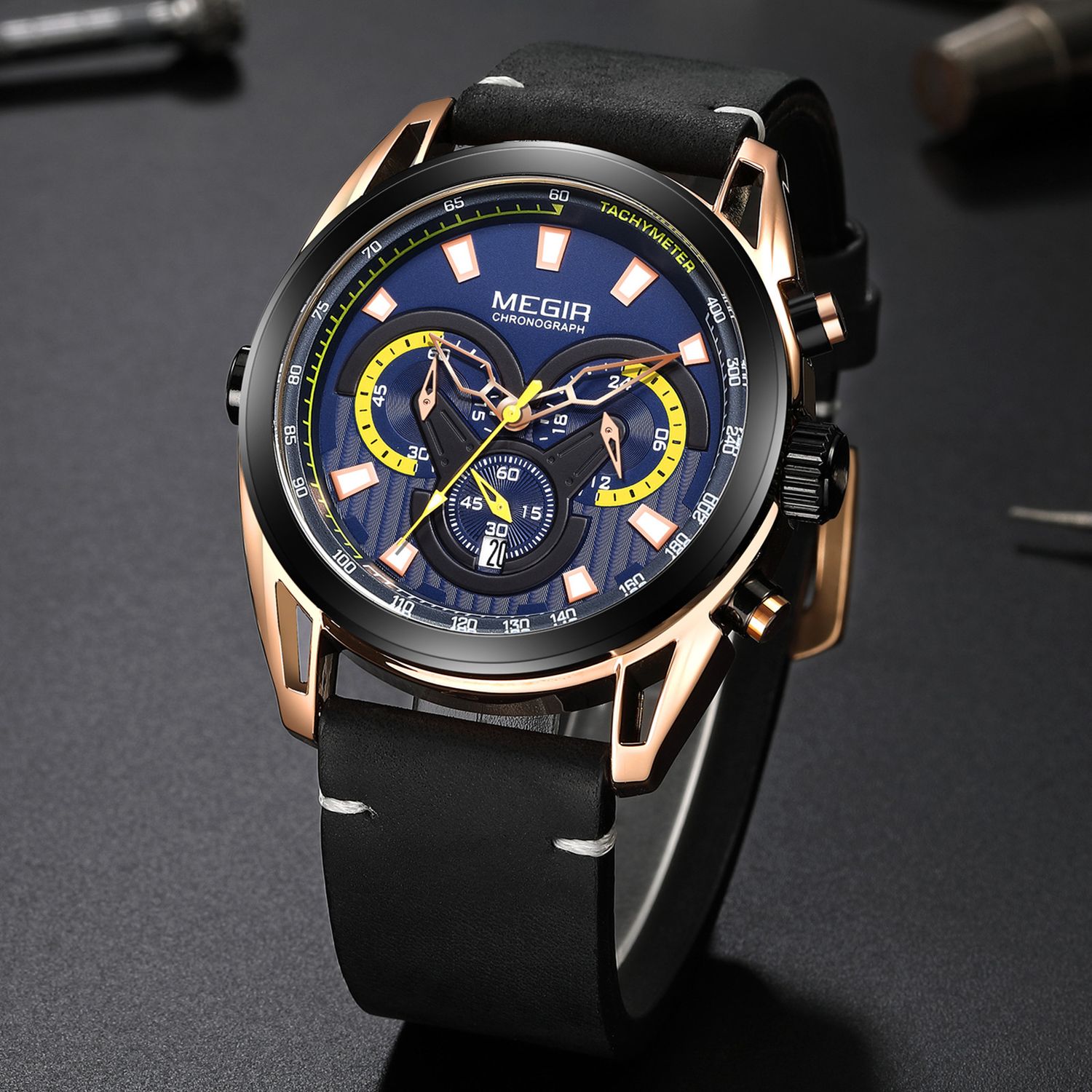 MEGIR 2135 men's chronograph watch, rose-gold case with blue dial and black leather strap, angled view