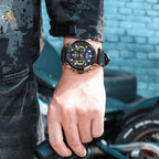 MEGIR 2135 men's chronograph watch on the wrist, rose-gold case with blue dial and black leather strap