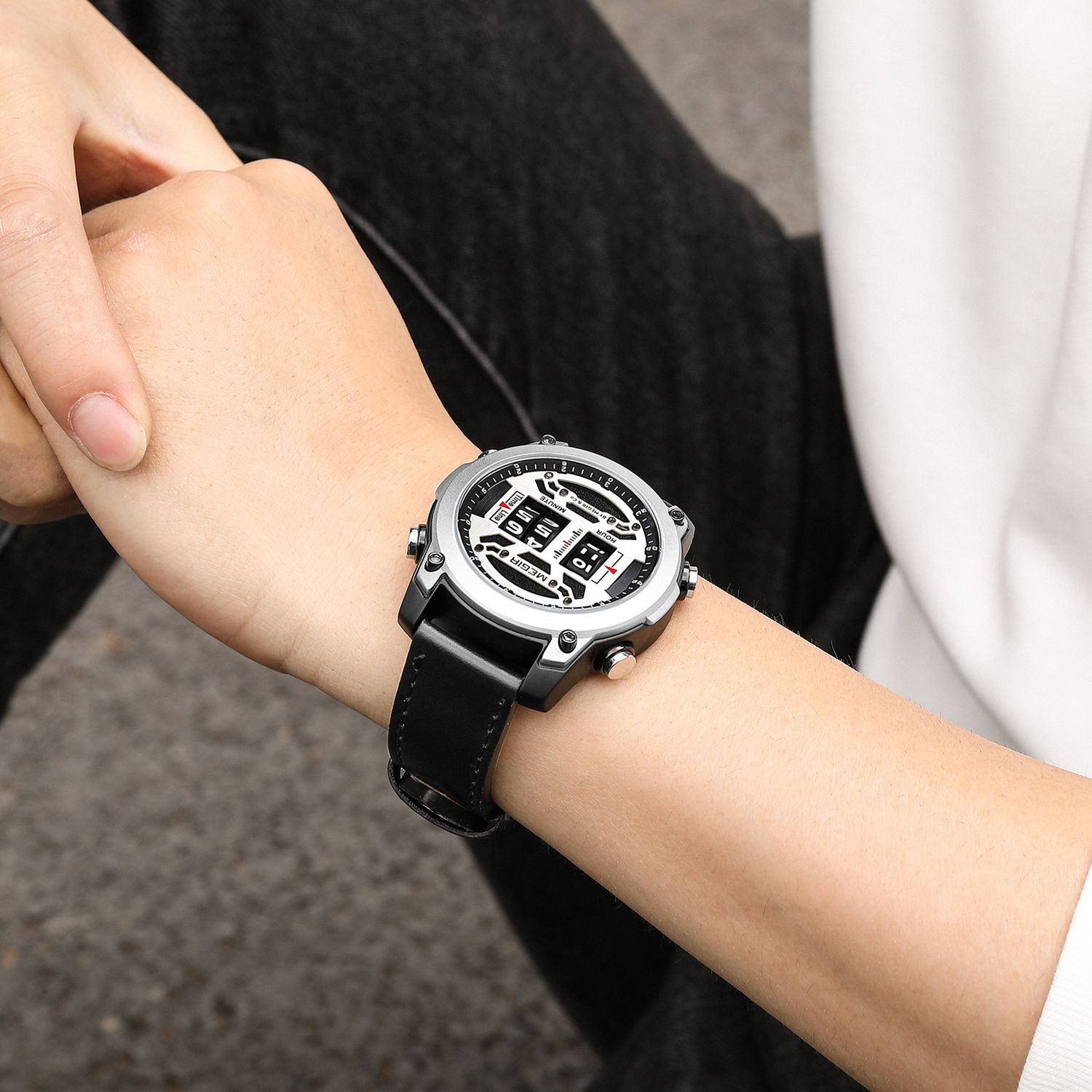 MEGIR 2142 men's sport watch on the wrist, silver case with white roller-barrel dial and black leather strap