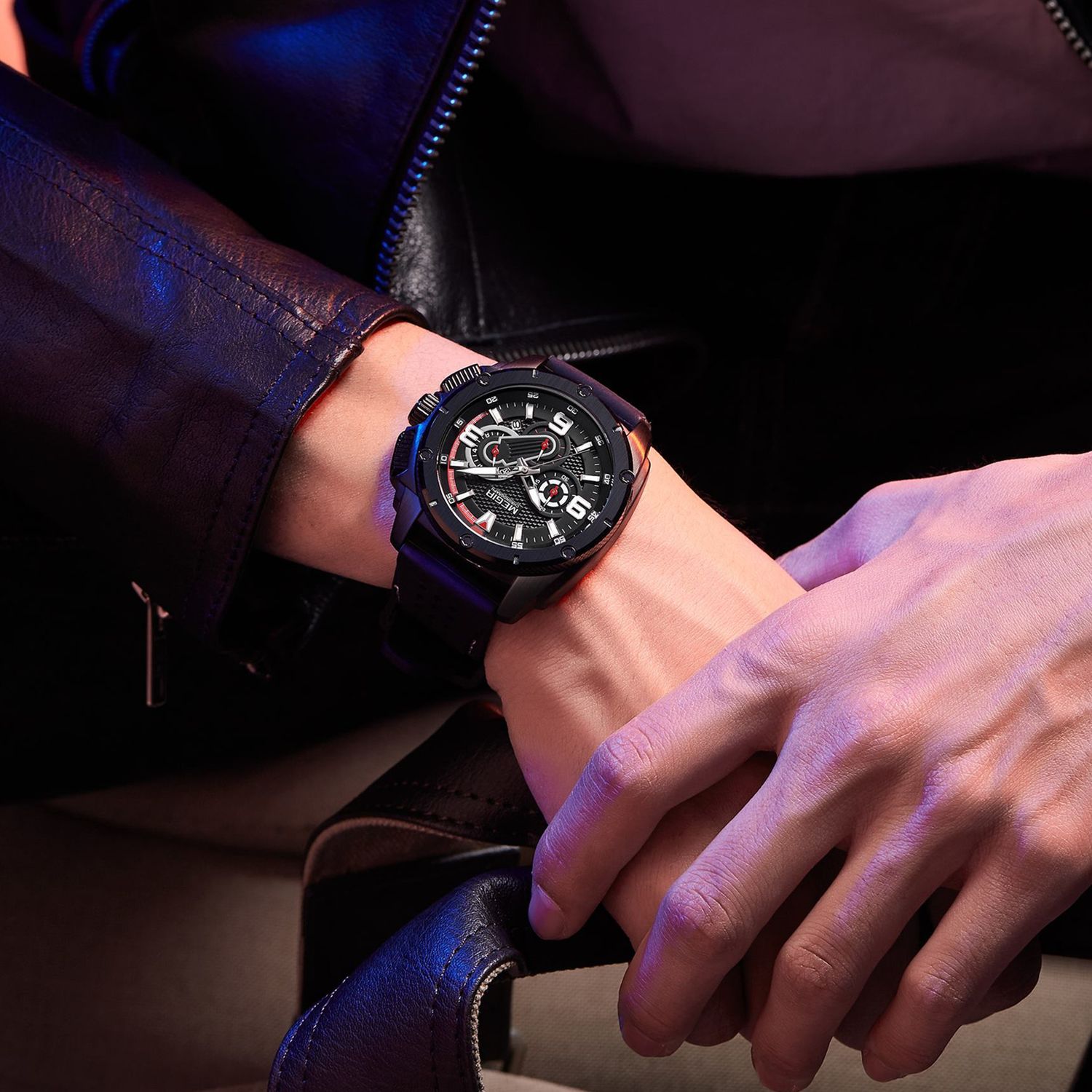 MEGIR 2147 men's chronograph watch on the wrist, black case with black dial and black silicone strap