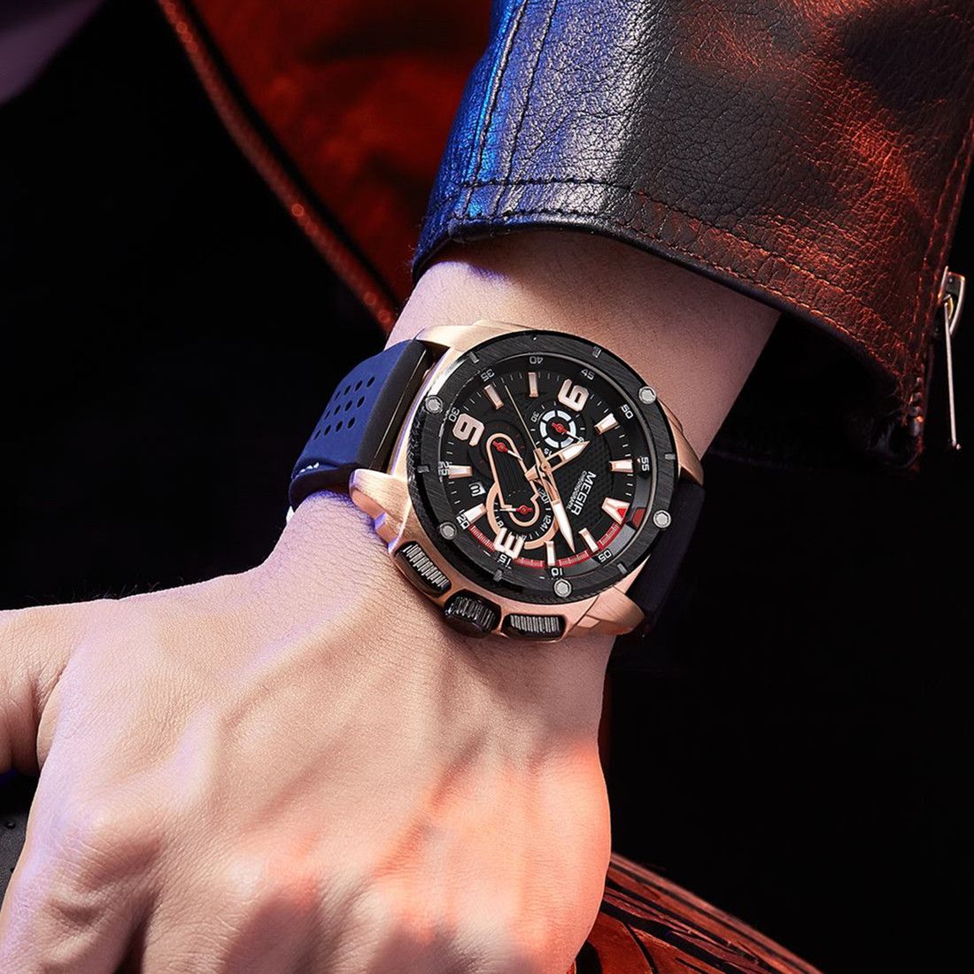 MEGIR 2147 men's chronograph watch on the wrist, rose-gold case with black dial and black silicone strap