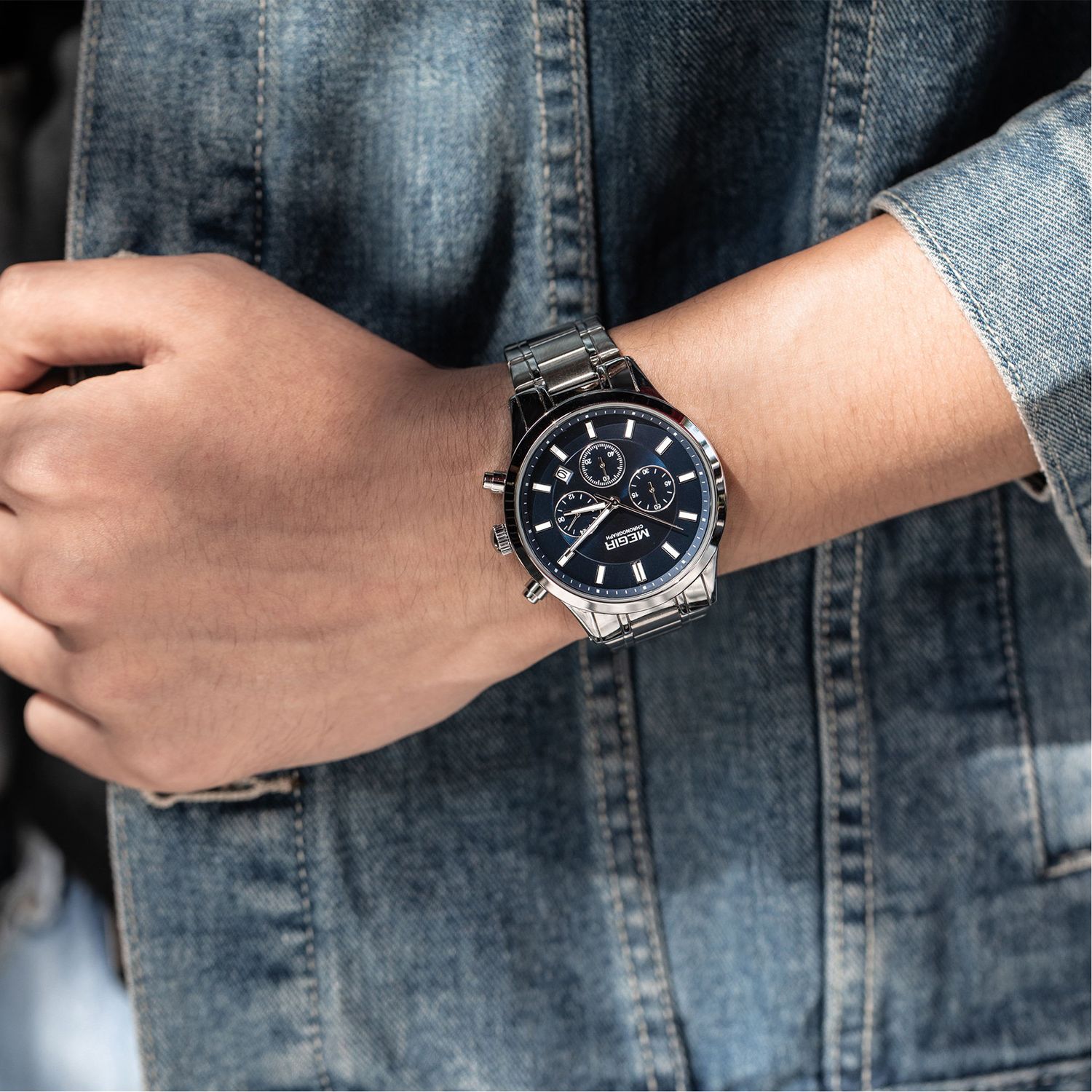 MEGIR 2150 men's chronograph watch on the wrist, silver case with blue dial and stainless steel bracelet