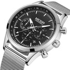 MEGIR 2153 men's chronograph watch, silver case with black dial and silver mesh bracelet, angled view