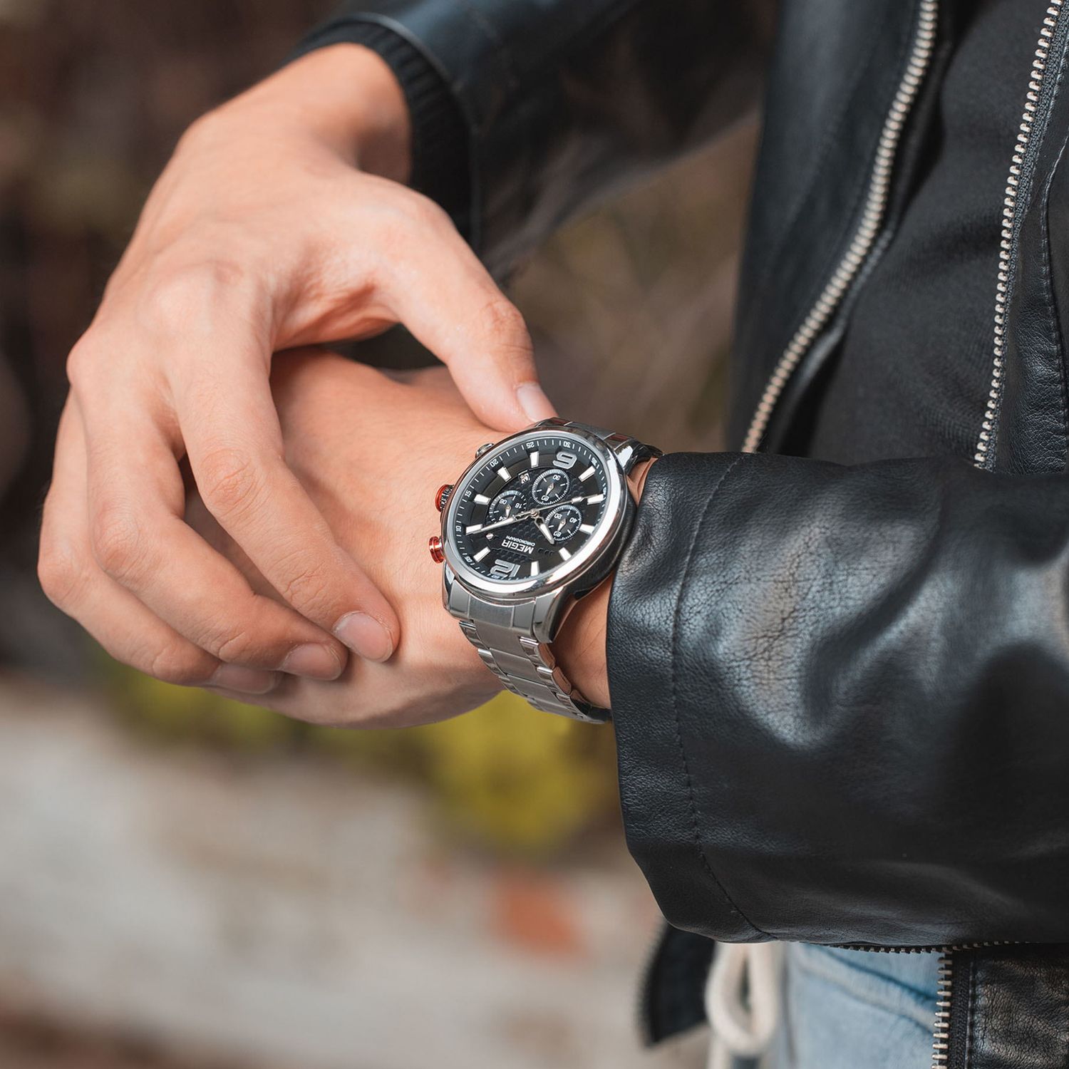 MEGIR 2156 men's chronograph watch on the wrist, silver case with black dial and stainless steel bracelet