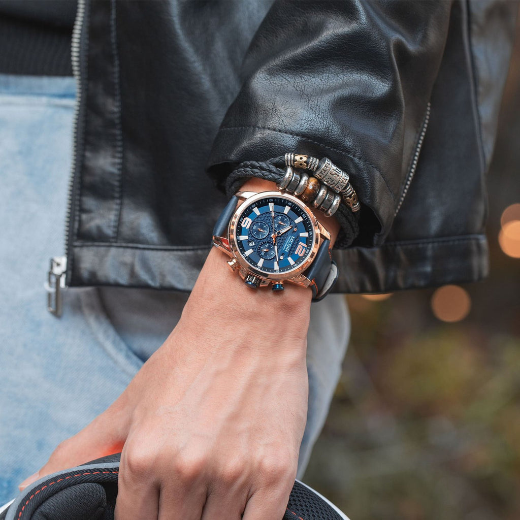 MEGIR 2156 men's chronograph watch on the wrist, rose-gold case with blue dial and blue leather strap