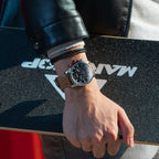 MEGIR 2156 men's chronograph watch on the wrist, silver case with black dial and brown leather strap