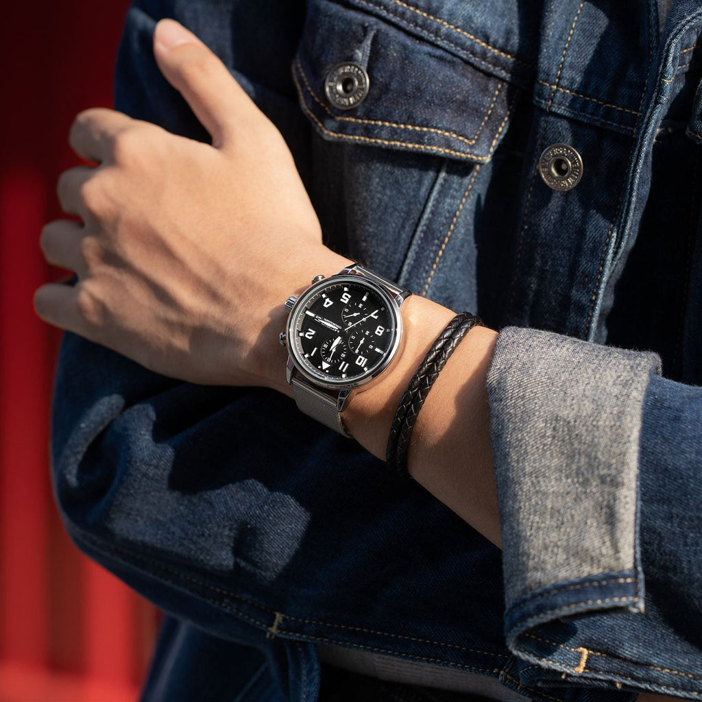 MEGIR 2157 men's chronograph watch on the wrist, silver case with black dial and silver mesh bracelet