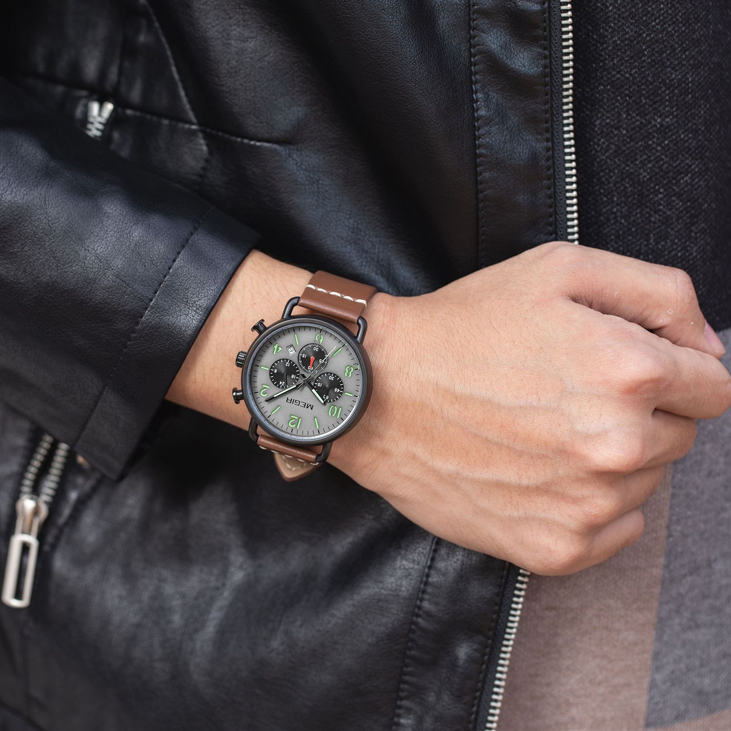 MEGIR 2158 men's chronograph watch on the wrist, black case with grey dial and brown leather strap