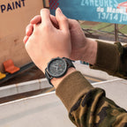 MEGIR 2159 men's chronograph watch on the wrist, black case with grey dial and black leather strap
