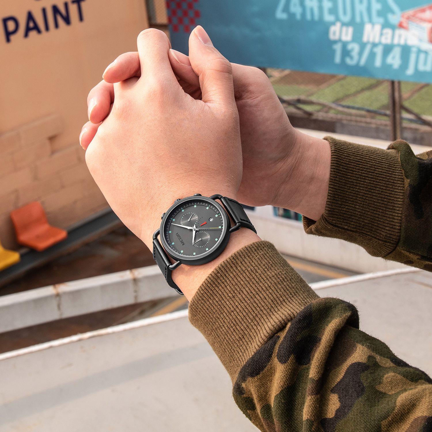 MEGIR 2159 men's chronograph watch on the wrist, black case with grey dial and black leather strap