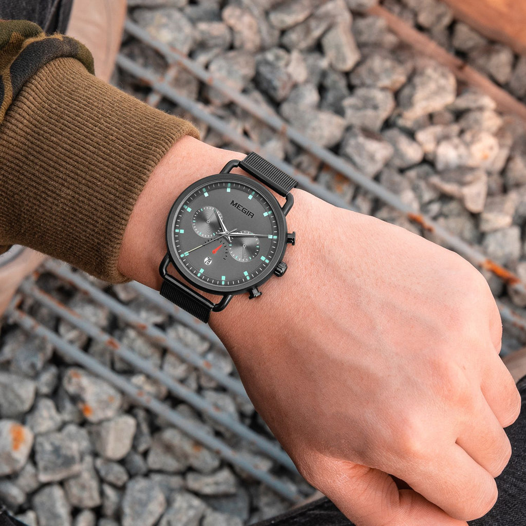 MEGIR 2159 men's chronograph watch on the wrist, black case with grey dial and black mesh bracelet