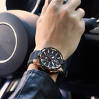 MEGIR 2161 men's chronograph watch on the wrist, rose-gold case with black dial and black silicone strap