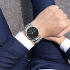 MEGIR 2164 men's dress watch on the wrist, silver case with black dial and stainless steel bracelet