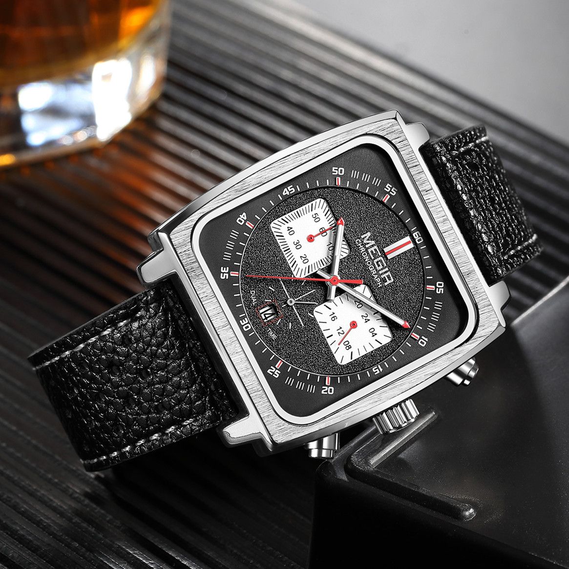 MEGIR 2182 men's chronograph watch, silver square case with black dial and black leather strap, angled view