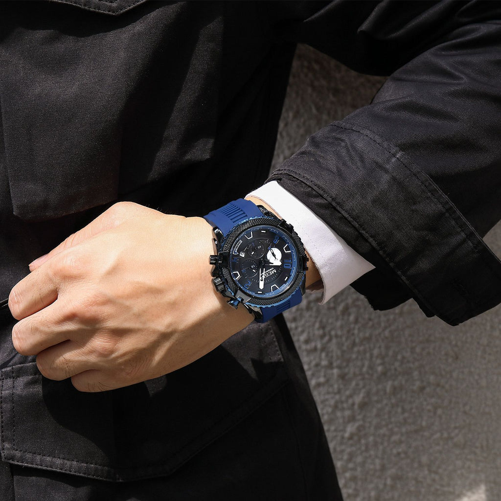 MEGIR 2200 men's chronograph watch on the wrist, black case with blue accents and blue silicone strap