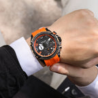 MEGIR 2200 men's chronograph watch on the wrist, black case with orange bezel and orange silicone strap